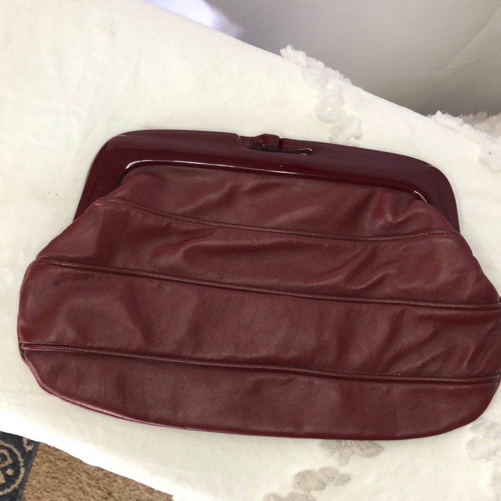 FAYVA Burgundy genuine leather Vintage clutch. Made in Italy. Snap closure.
